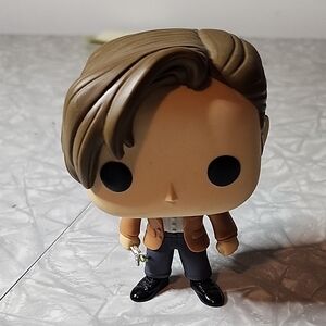 Brown-Haired Vinyl Figure